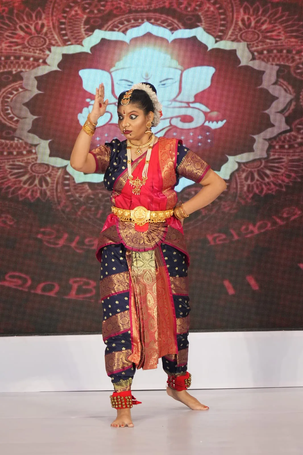 A classical dancer with a disability in full costume
