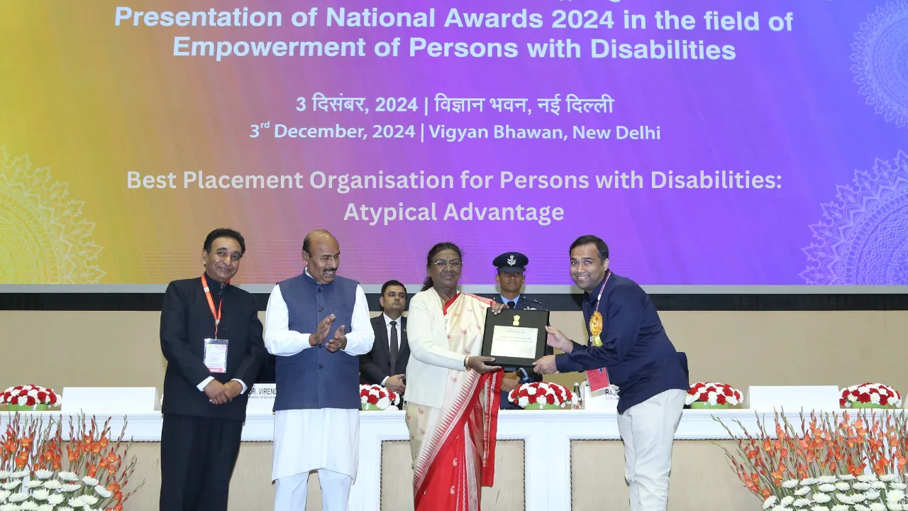The President of India presenting the National Award to Atypical Advantage at Vigyan Bhawan